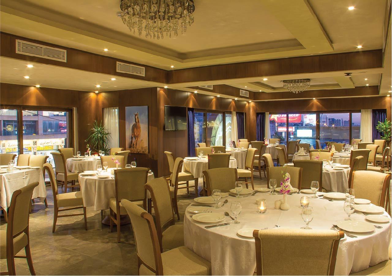 โรงแรมเธาแซนด์ ไนท์ อัมมาน ภายนอก รูปภาพ Restaurant interior